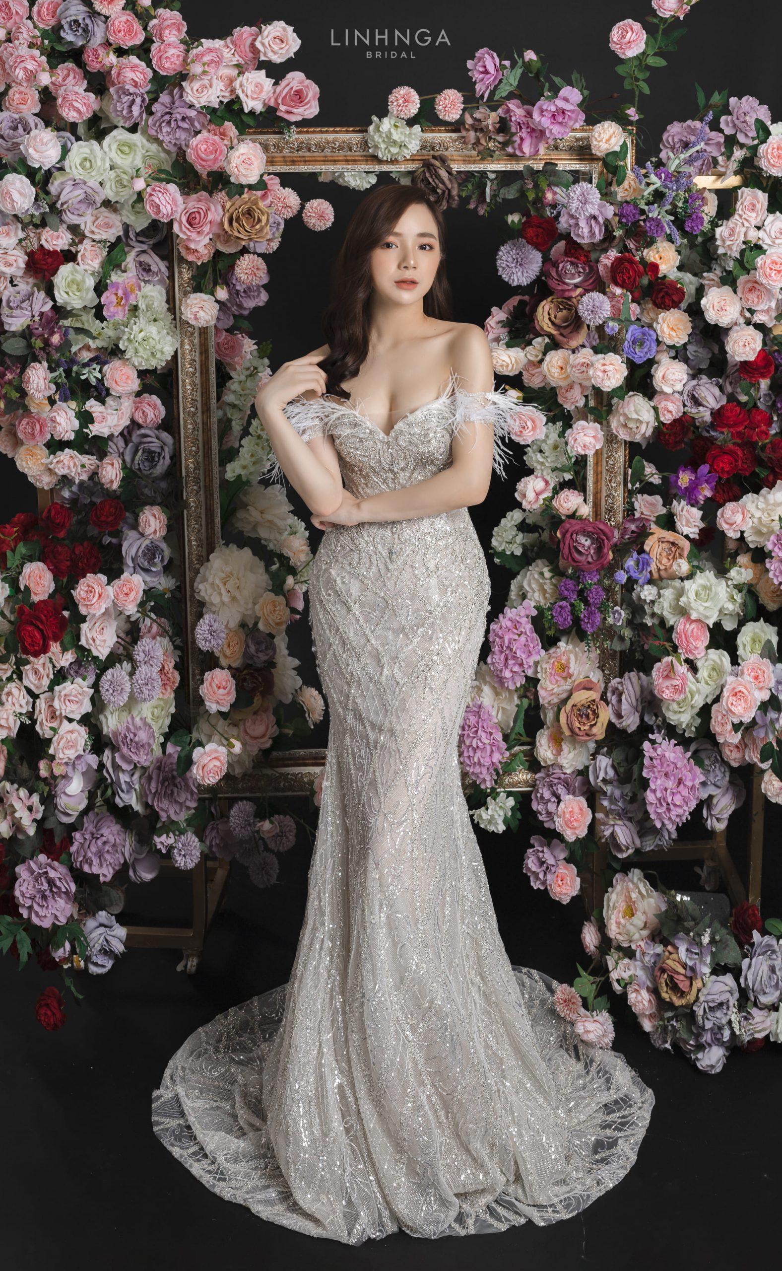 Cô dâu Nhã Tiên quyến rũ khi diện váy cưới đuôi cá trễ vai của Linh Nga Bridal